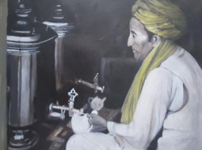 Homme afghan remplissant une théière, de Annie Darmon Tetart The Art Cycle